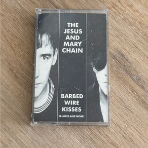 Source Unknown Black and White Cassette Tape